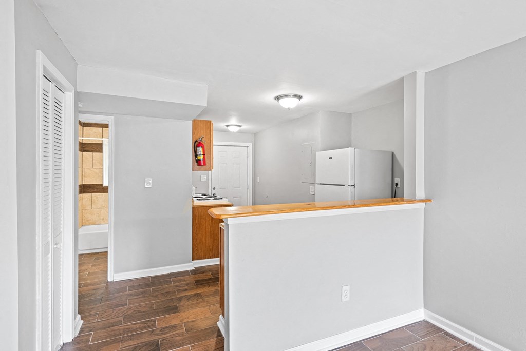 Kitchen With Ample Storage at Gardens at Washington Park, Georgia , 30314