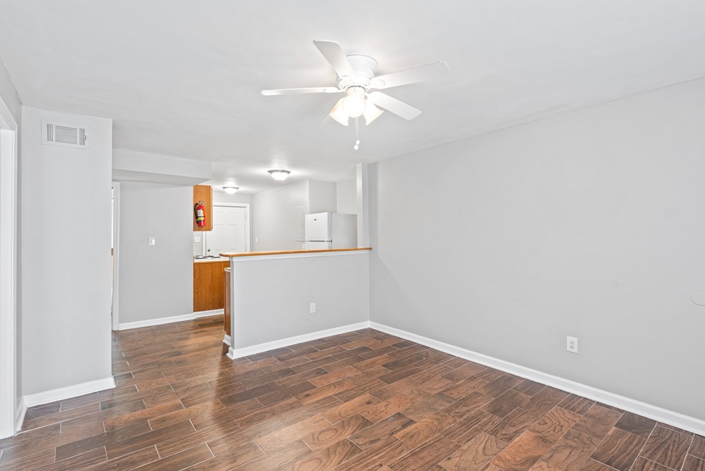 Spacious Living Room Updated Flooringat Gardens at Washington Park 2, Georgia