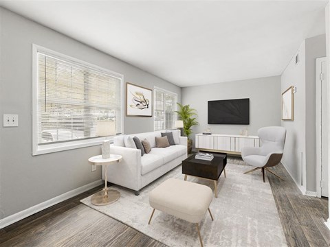 Living room with modern TV at Pinewood Townhomes, Tucker, 30084