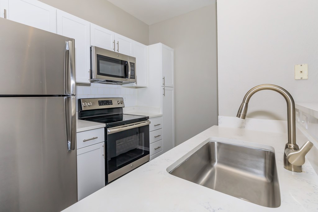 Kitchen with farm stye sink.