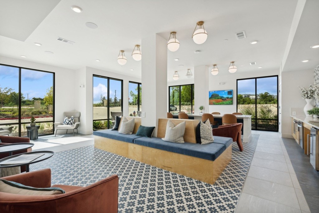 Clubhouse with lounge seating and large windows