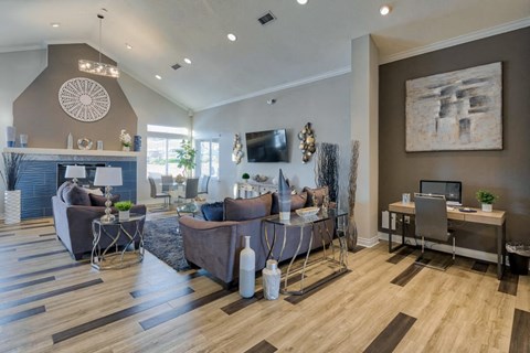 a living room with a couch and a fireplace