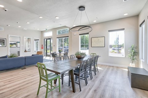 the dining room is open to the living room and kitchen