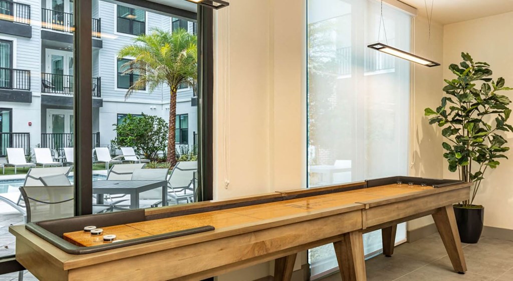 a game table in front of a window in a room