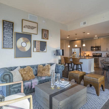 a living room with a couch and a table