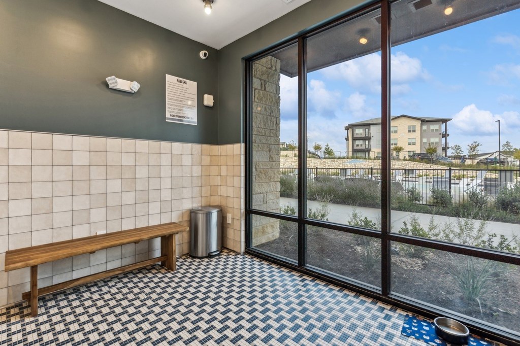 Pet spa with a bench and large windows