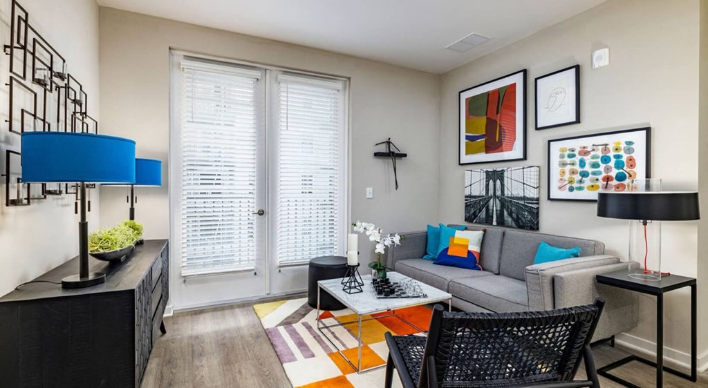 a living room with a couch and a table