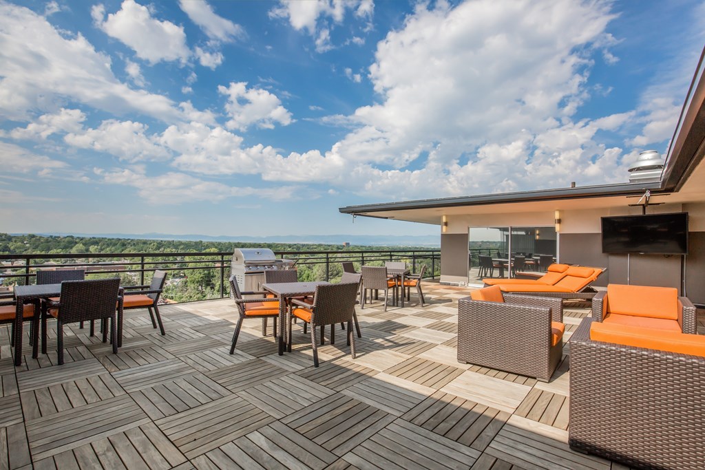 Rooftop deck with table and chairs