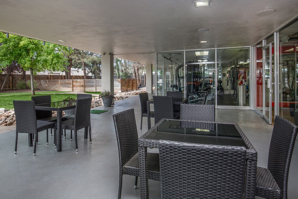 Outdoor lounge area with table and chairs