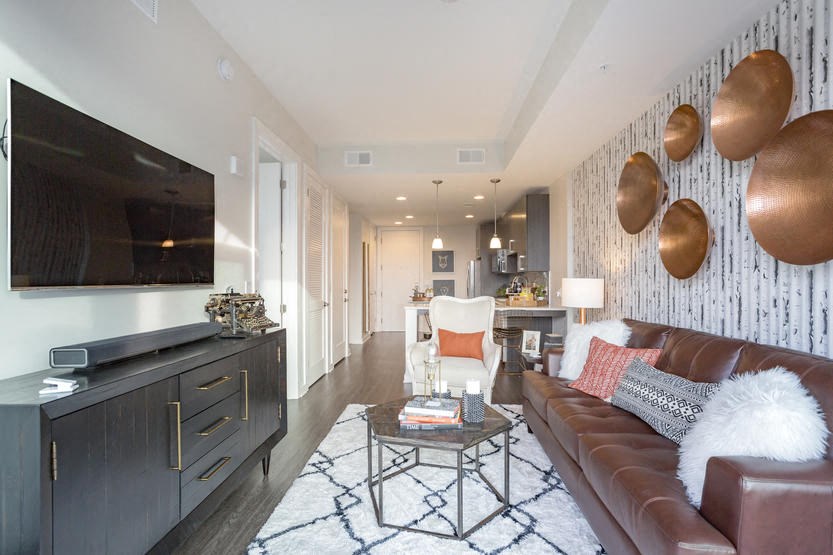 a living room with a couch and a television