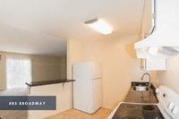Kitchen and Living Room at 885 Broadway - Photo Gallery 5