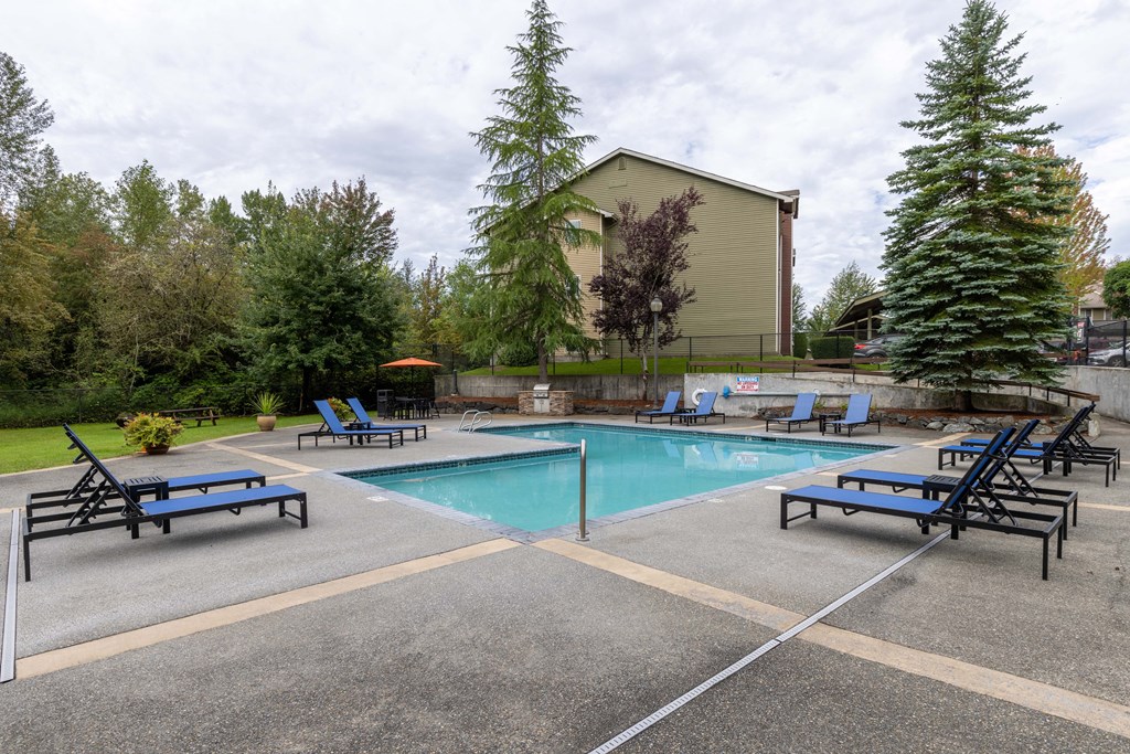 Swimming pool with lounge chairs