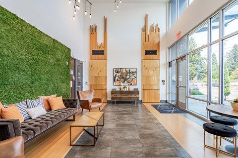 a living room with a green wall and a couch