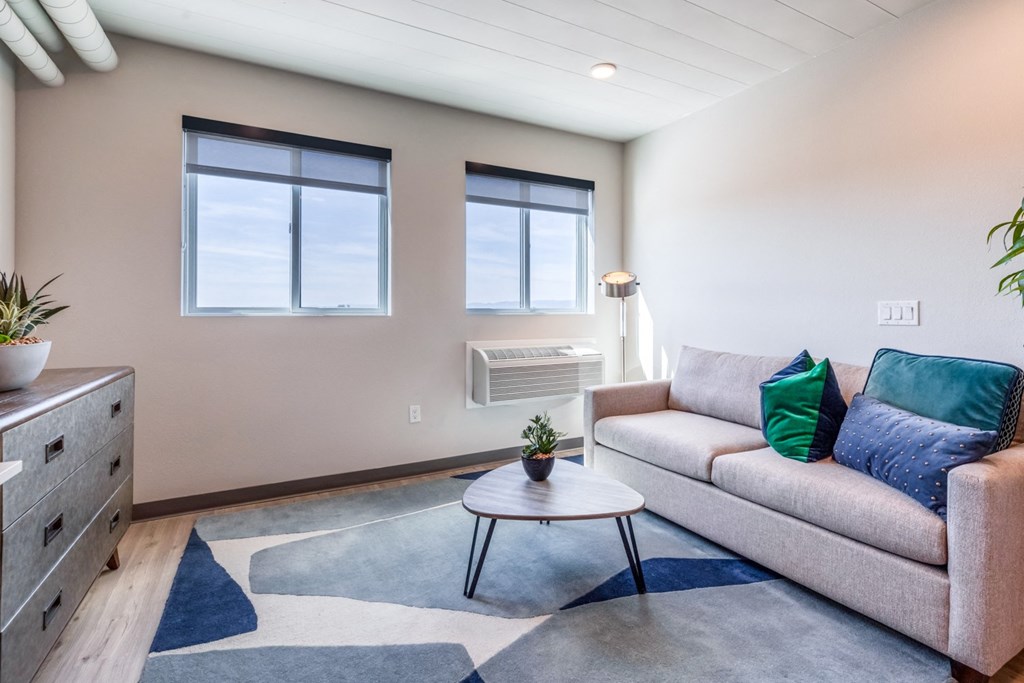a living room with a couch and a coffee table