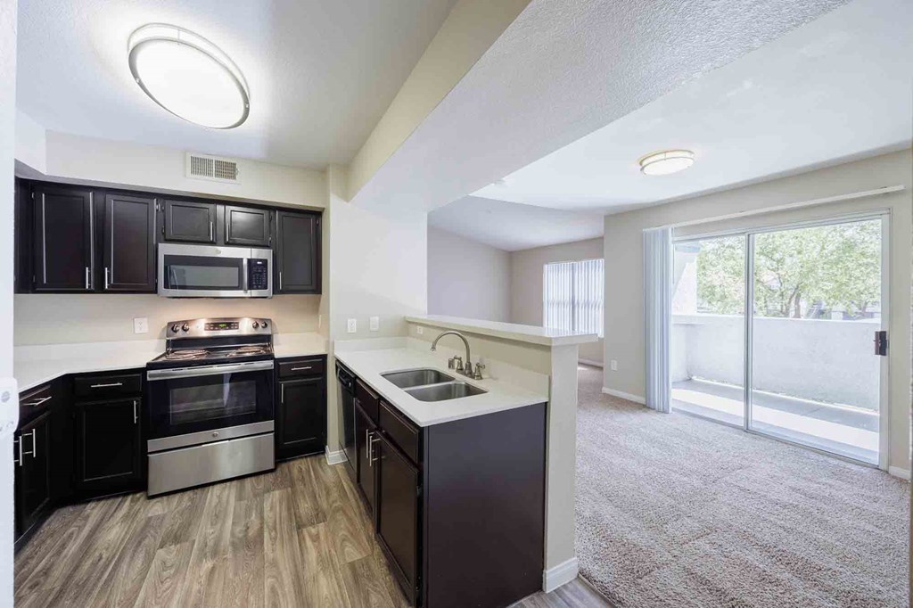 A kitchen with stainless steel appliances.