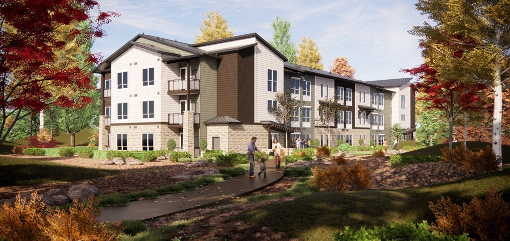 a rendering of an apartment building with a garden and a pathway