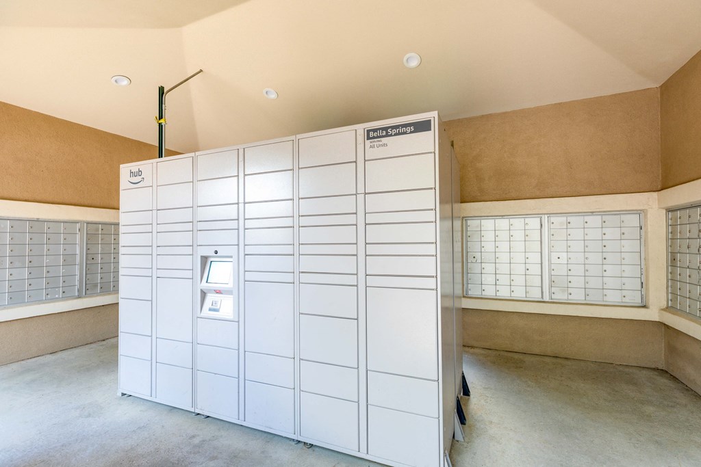 a bunch of white mailboxes in a room