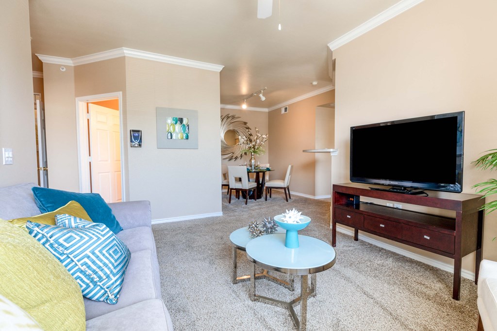 a living room with a couch and a television