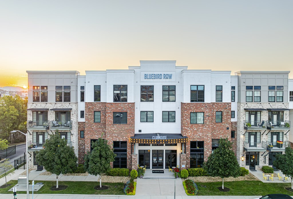 A building with the name Bluebird Row on it.