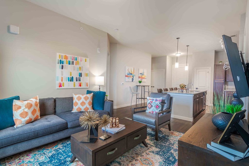 a living room with a couch and a table