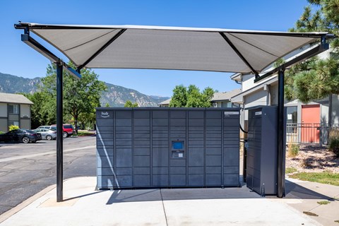 a public restroom with a cistern on the side of the street
