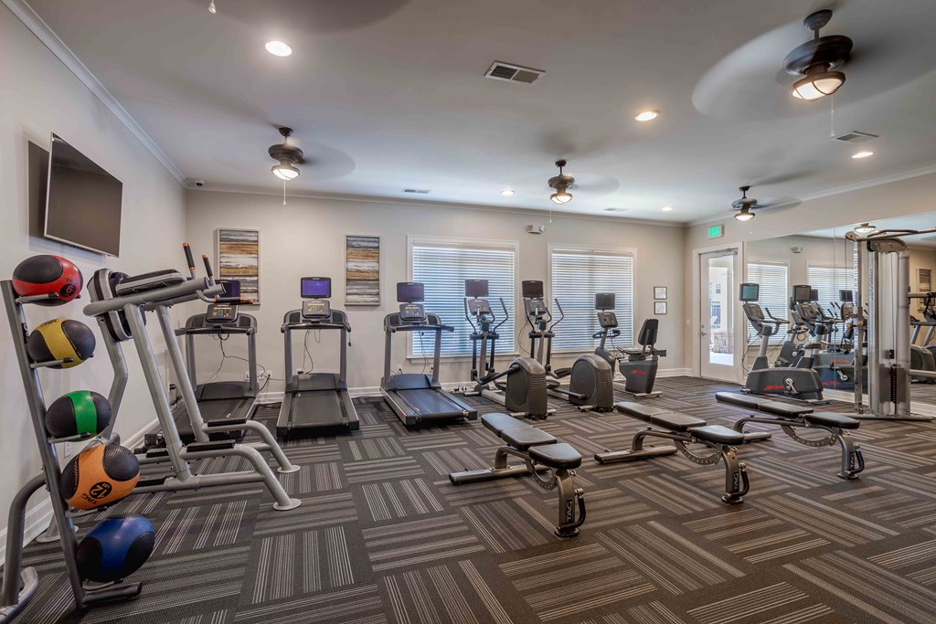 fitness center with workout equipment