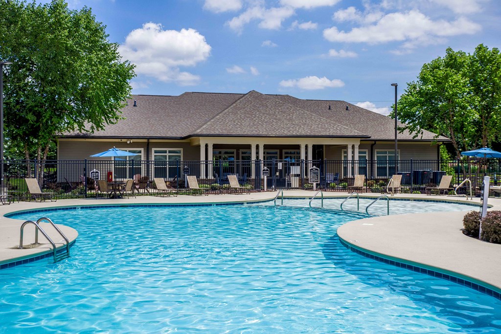 swimming pool with chairs