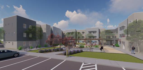 A modern residential area with apartment buildings and a park.