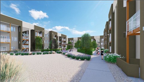 A modern residential area with a sidewalk and apartment buildings.