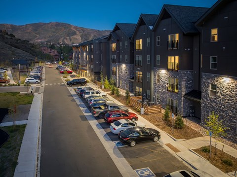 A parking lot with cars parked in it.