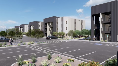 A parking lot with a building in the background.