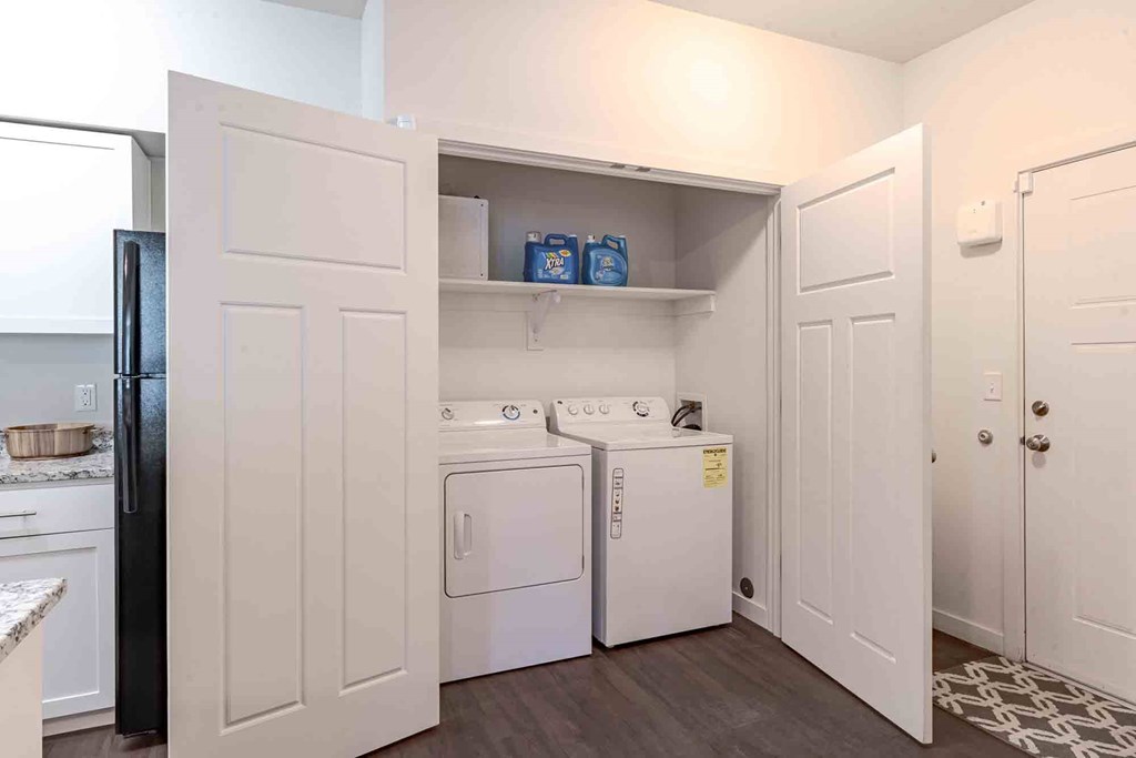 A laundry room with a washer and dryer.