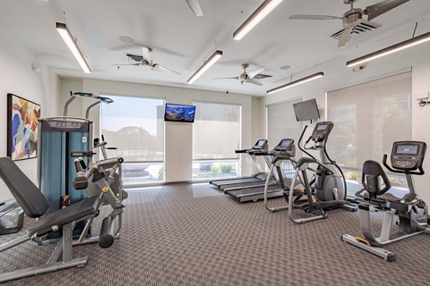 fitness center with a variety of equipment