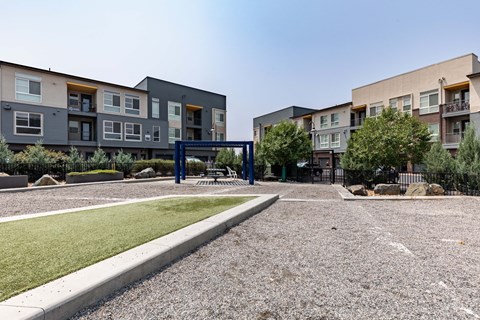 the preserve at ballantyne commons courtyard with playground and apartment buildings