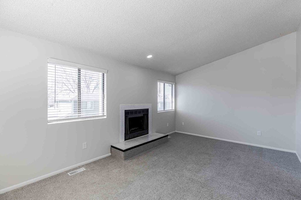Spacious living room with a fireplace