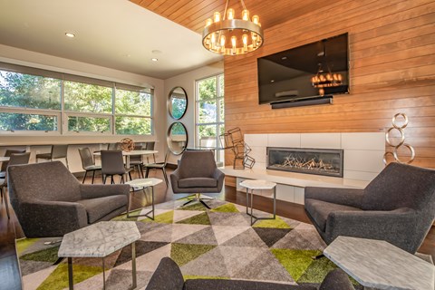 Resident lounge area with TV and chairs