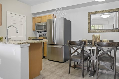 A kitchen with stainless steel appliances.