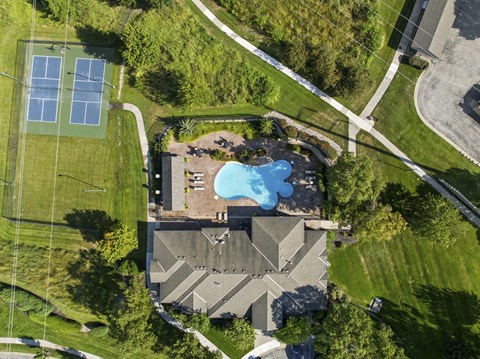 Arial view of tennis court and pool.
