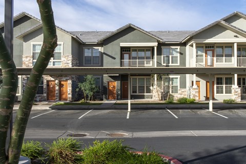 a street view of a building with covered parking