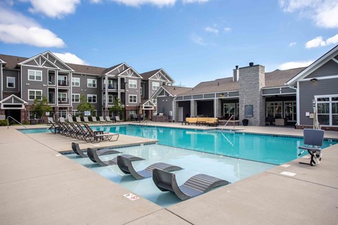 our apartments offer a swimming pool with chaise lounge chairs