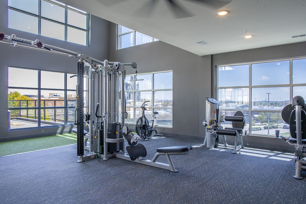 A gym with a view of the city.