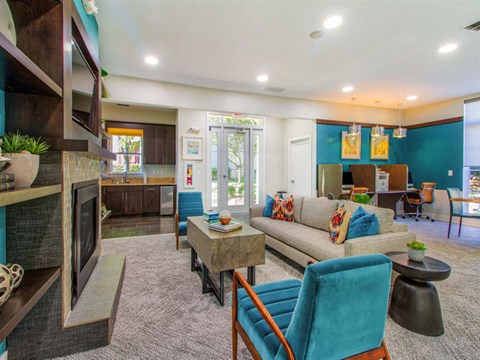 a living room with a couch and a fireplace