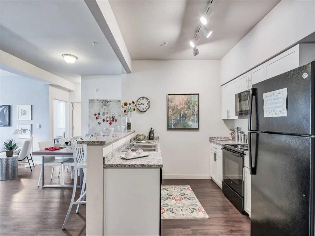 Kitchen with black appliances