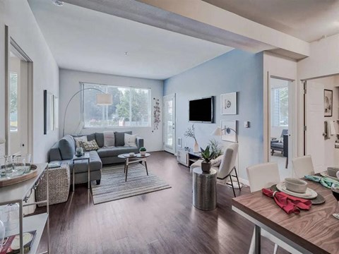 a living room with a couch and a table