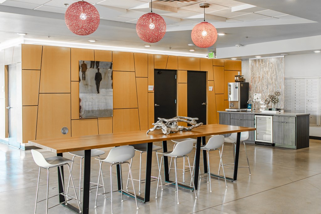 clubhouse  with a long wooden table and chairs