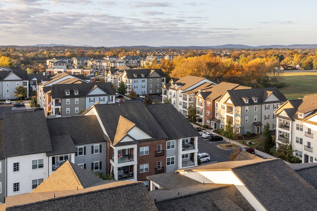 an aerial view of a row of apartment buildings