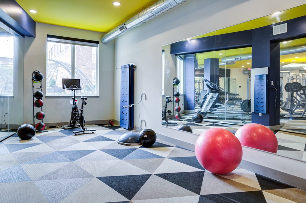 A gym with a black and white checkered floor.