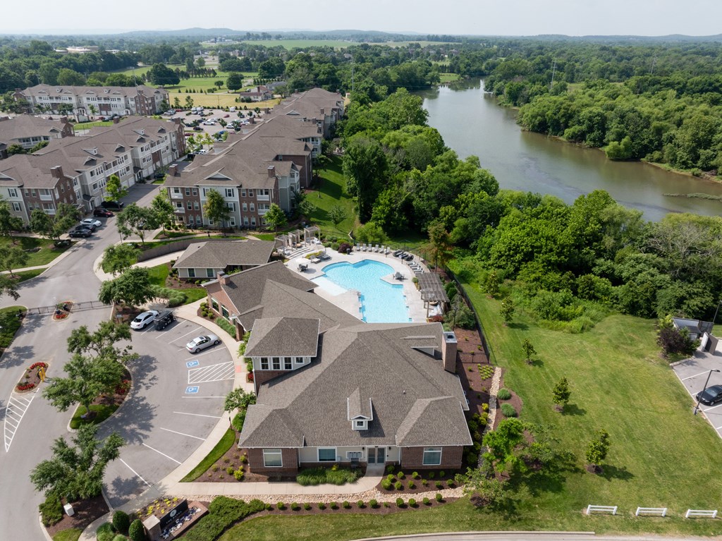 Aerial view of community with a river view