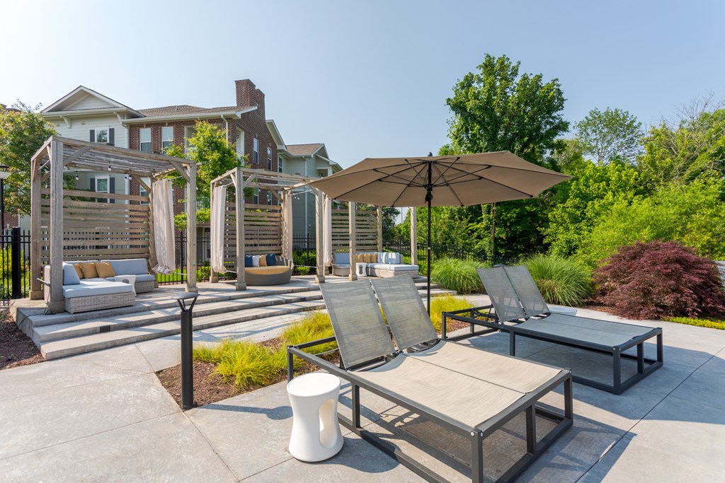 Pool lounge area with cabanas