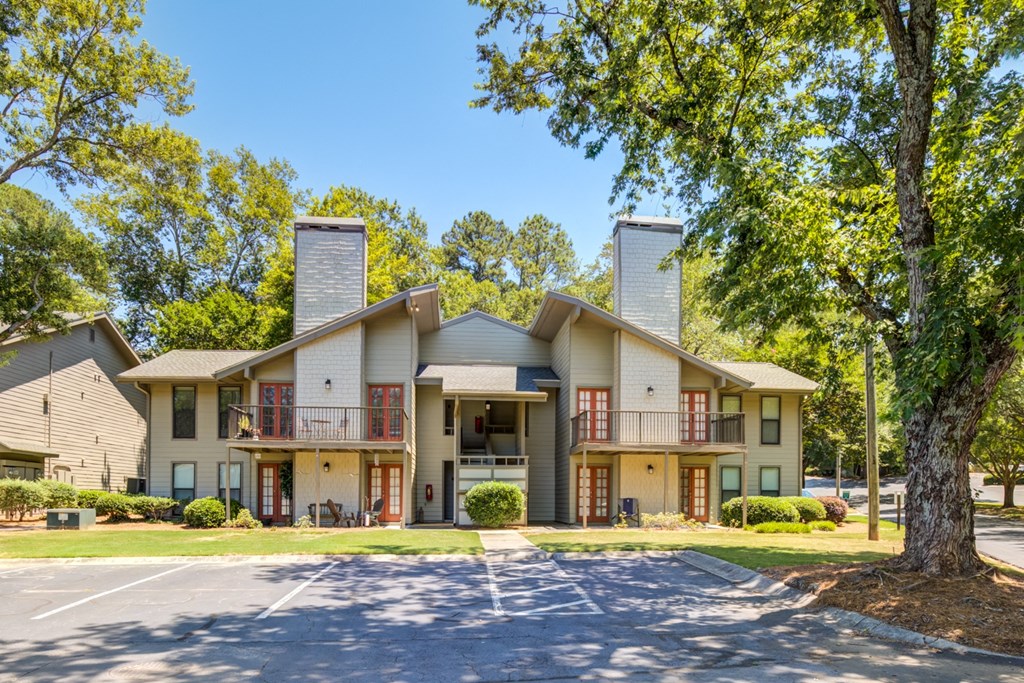our apartments have a large parking lot and ample trees